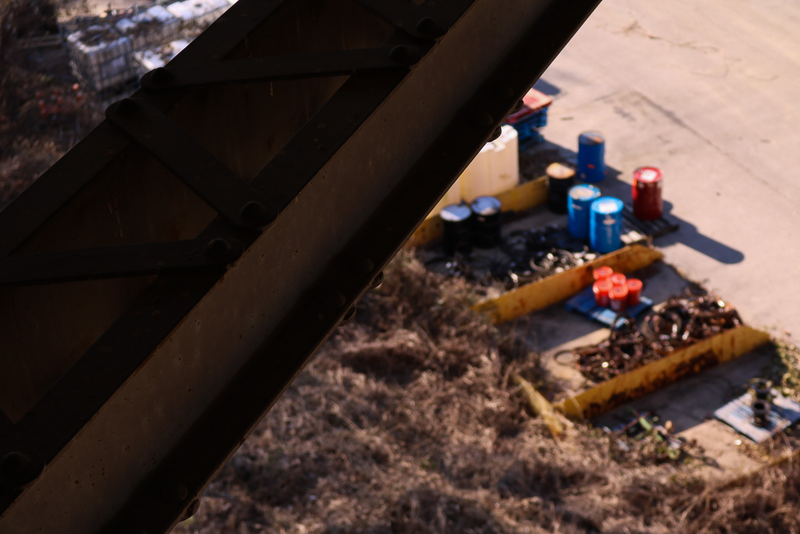 Dockyards below the Memphis-Arkansas Bridge, viewed from underneath the bridge; ISO 100, 55 mm, f/5.6, 1/125